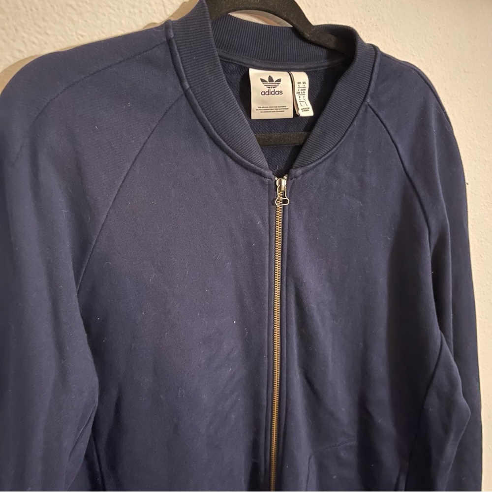 Zip up.